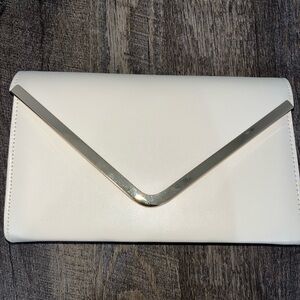 Gold and cream clutch